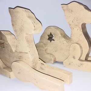 Pair Of Wooden Camels With Articulated Legs Star Cutout on body
